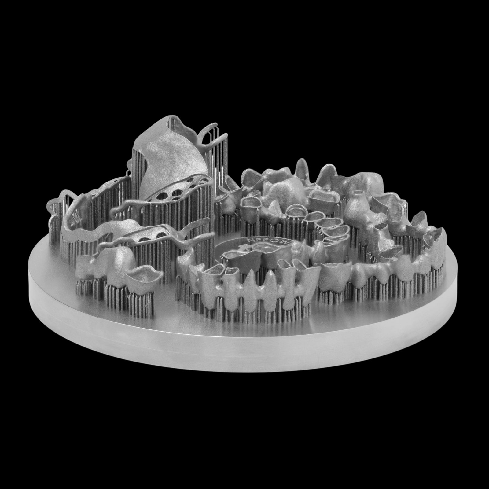 Build plate with metal dental frameworks printed on the Malachite 3D printer